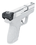 A handgun with a sleek, silver and black design angled slightly downward.