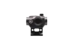 Black tactical optic device with compact design, front view.